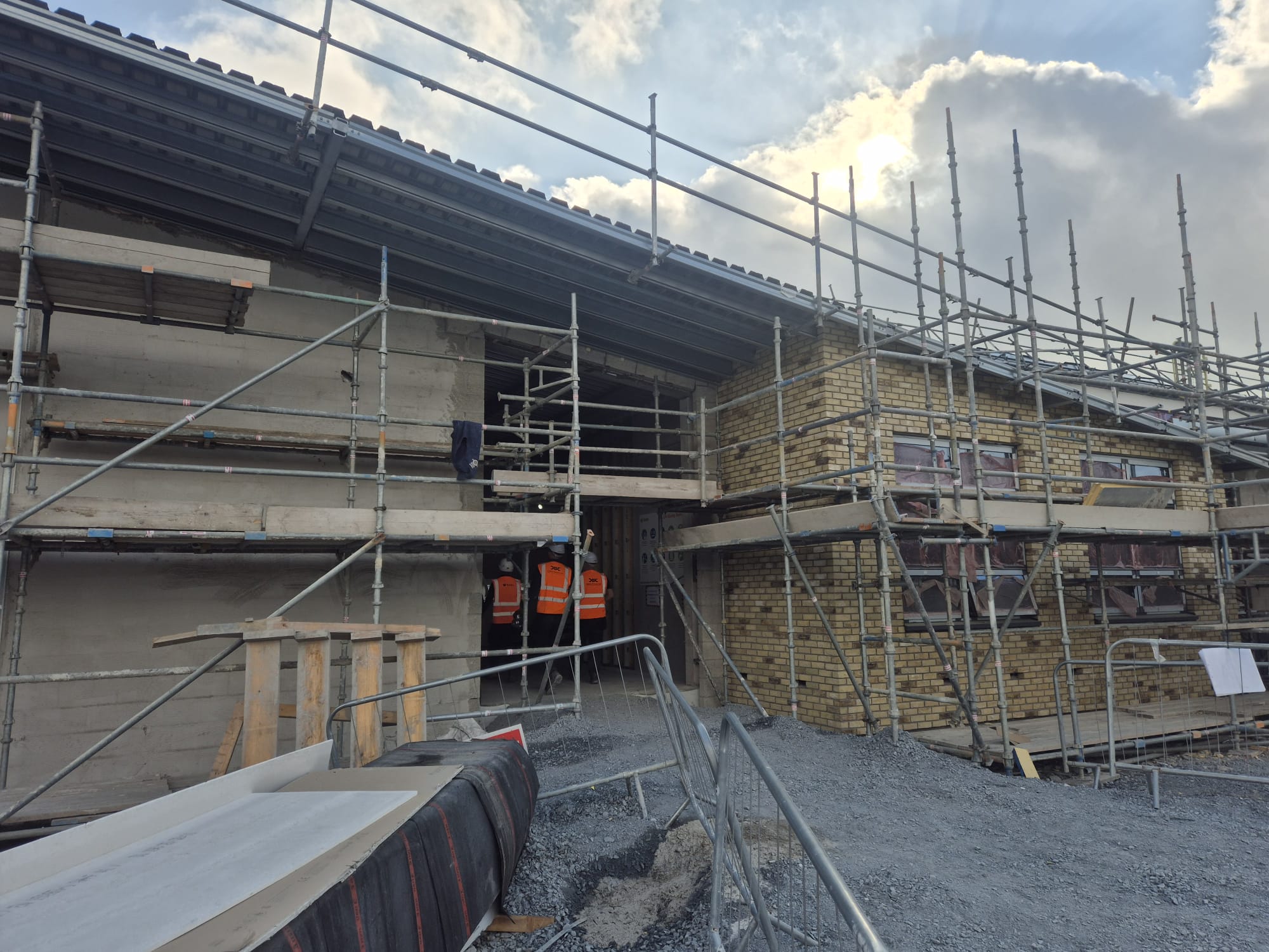 Murnion Construction site team in hi-vis on a live brickwork project