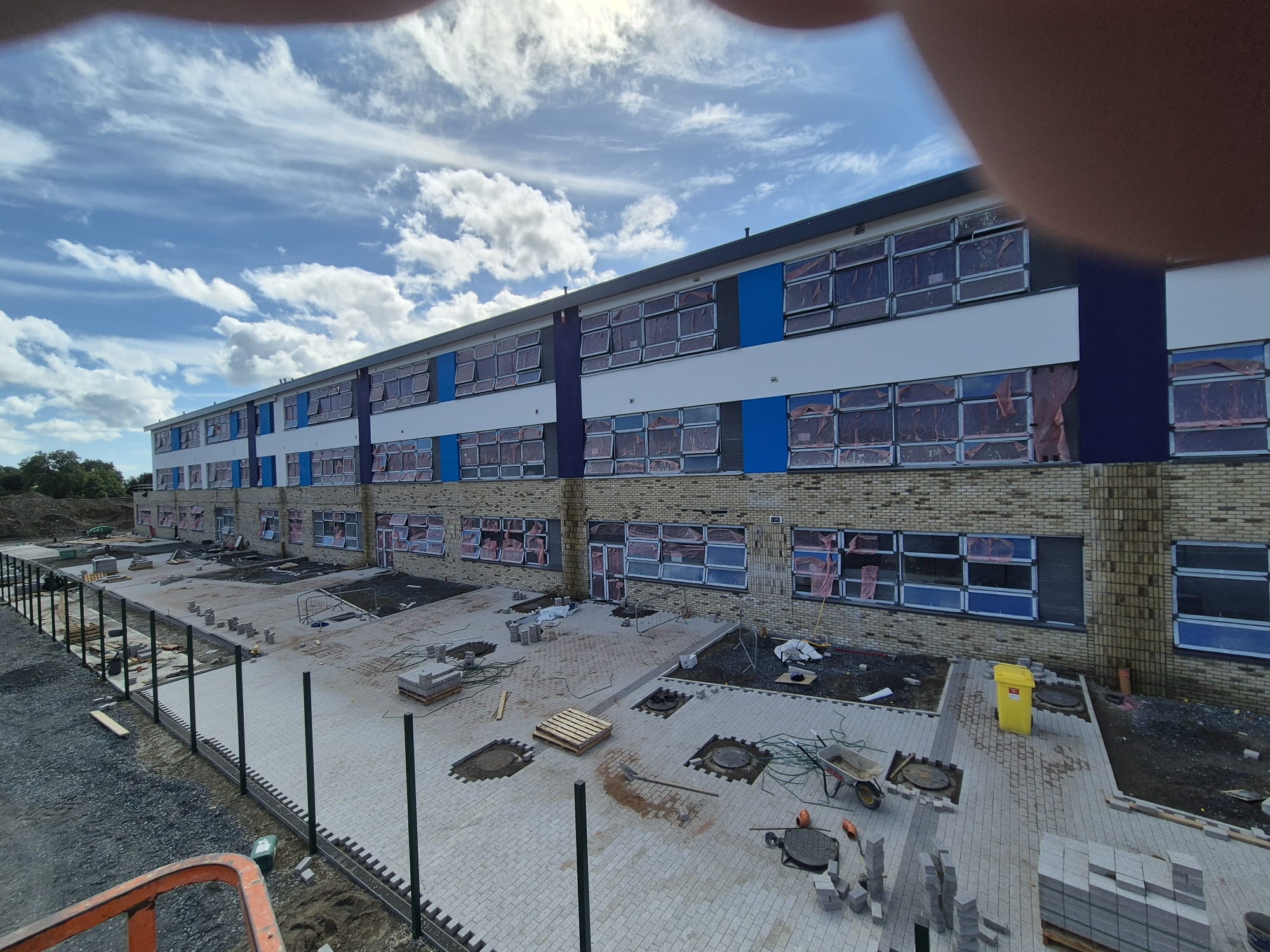 Long completed brick and render facade of a Murnion Construction Ltd educational project